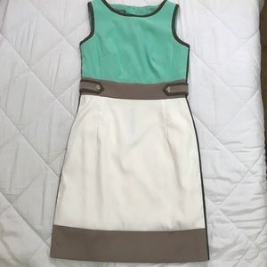 A light blue with white and gray dress